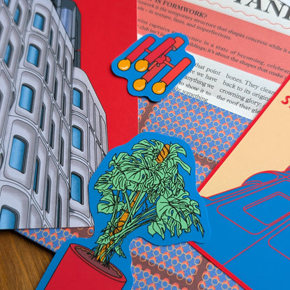 Formwork print club, the standard hotel. Colorful paper cutouts of a building, tree, and abstract shapes on a architecture newspaper background